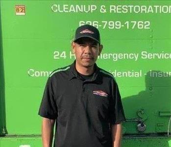 Pablo in front of SERVPRO truck