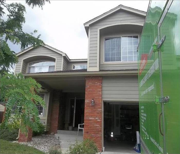 House facade with SERVPRO truck 