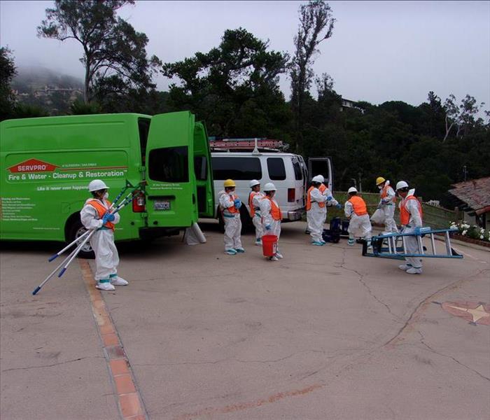 A team of SERVPRO of Glendora / San Dimas technicians unloading the trucks of equipment.